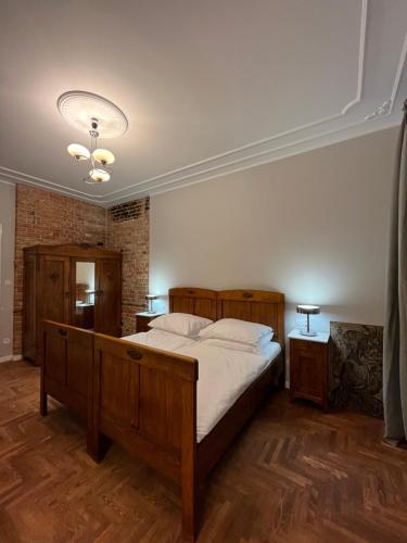 Łóżko lub łóżka w pokoju w obiekcie Lipowa Loft Apartments