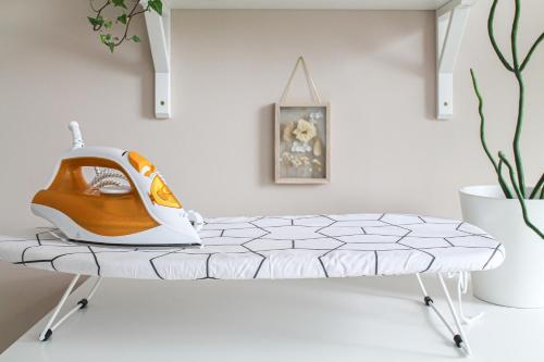 a room with a bed with a helmet on it at Relax Apartment - für Familien, stadtnah, mit Parkplatz in Koblenz
