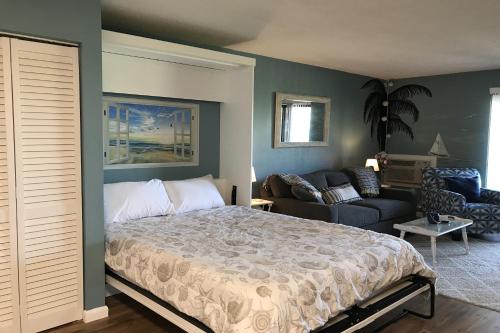 Ένα ή περισσότερα κρεβάτια σε δωμάτιο στο Key West Villa 115