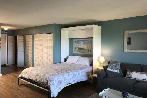 Ένα ή περισσότερα κρεβάτια σε δωμάτιο στο Key West Villa 115