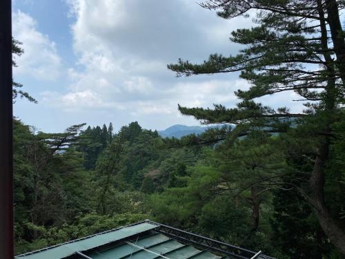 a view from a house in the forest at Rokko Outdoor Station FOTON in Kobe