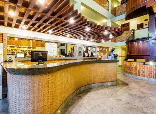 
The lobby or reception area at Pizzato Praia Hotel
