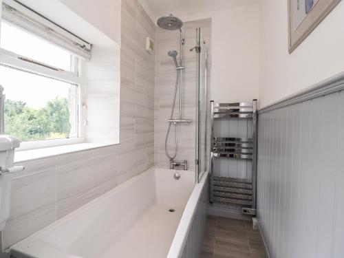 A bathroom at Lavender Cottage