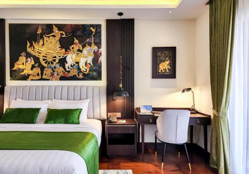Postel nebo postele na pokoji v ubytování Borei Angkor Resort & Spa