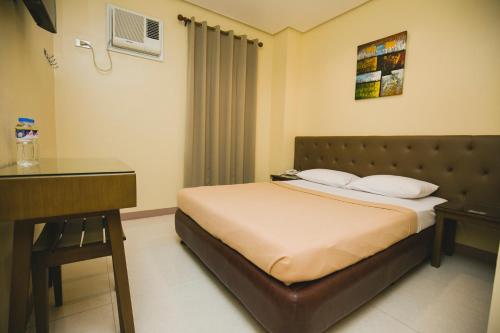 Postel nebo postele na pokoji v ubytování Hotel 801