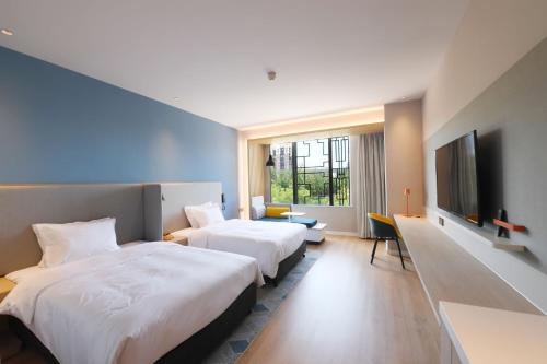 Photo de la galerie de l'établissement Holiday Inn Express Tianjin Binhai, an IHG Hotel, à Binhai