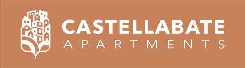 a sign that reads cateelablearmaarma apartments with a tree at Castellabate Apartments Camere in Castellabate