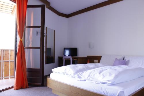 Una cama o camas en una habitación de Zur Mühle