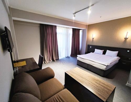 Cama o camas de una habitación en Golden Palace Hotel