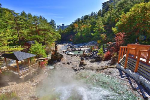 an aerial view of a river in a park at Urakusatsu TOU in Kusatsu