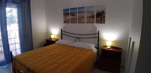 Ένα ή περισσότερα κρεβάτια σε δωμάτιο στο Casa Jolia