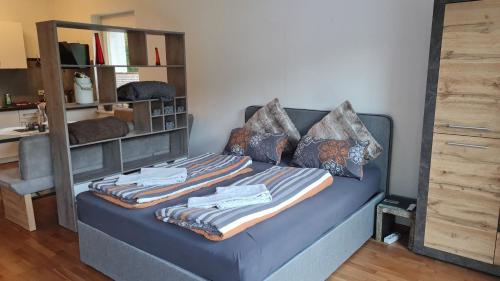 Кровать или кровати в номере Ferienapartments Bensch - Haus Reiskofel