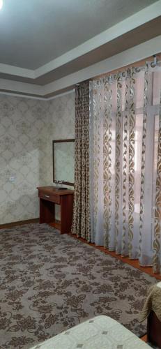 TV a/nebo společenská místnost v ubytování Hotel SUGD & Guest House