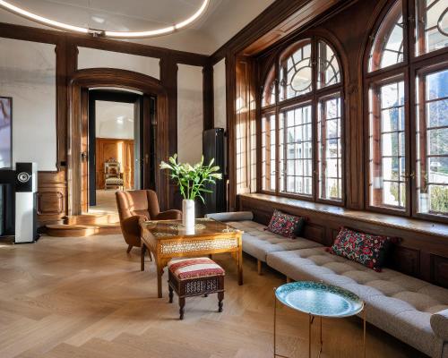a living room with a couch and a table at Villa Unterswand - Self Check-in in Grünau im Almtal
