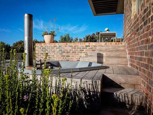 Κήπος έξω από το Stonehaven Eco Cabins
