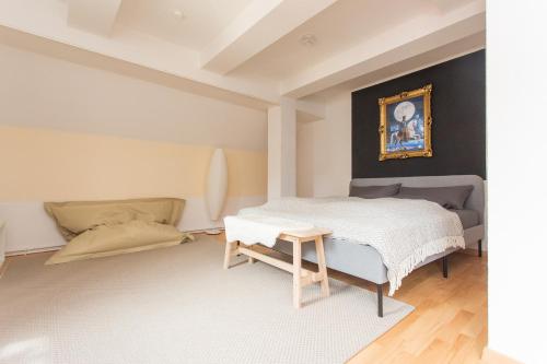 Ένα ή περισσότερα κρεβάτια σε δωμάτιο στο FULL HOUSE Premium Apartments Halle City KU15