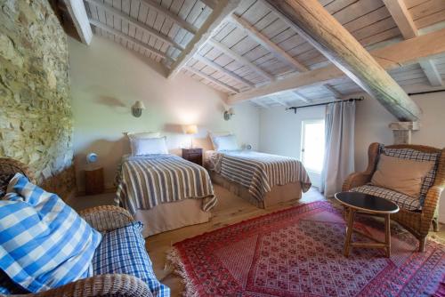 Un pat sau paturi într-o cameră la Le Mas de Panier