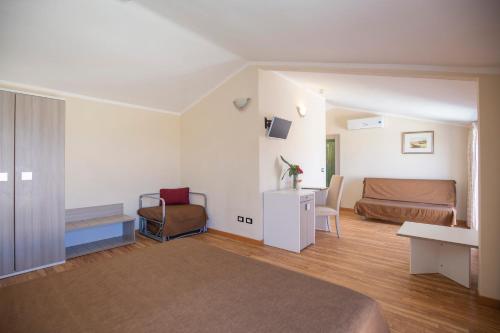 Posezení v ubytování Hotel Fabricia