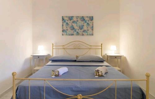 A bed or beds in a room at Casa Gioia