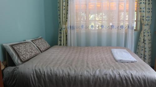 Posteľ alebo postele v izbe v ubytovaní Tranquil Homestays