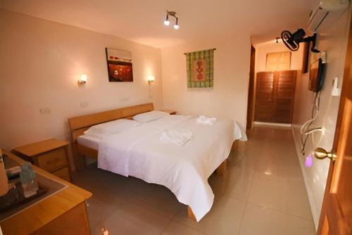 Postel nebo postele na pokoji v ubytování Alona42 Resort
