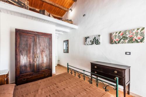 Agriturismo Val Di Notoにあるベッド
