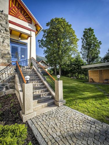 a set of stairs in front of a house at Vila Lavina in Smokovce