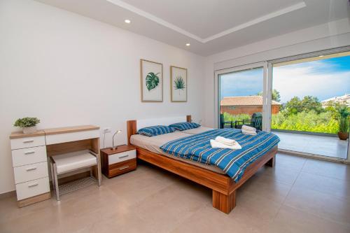 Ένα ή περισσότερα κρεβάτια σε δωμάτιο στο Vila Delma in Fazana,Peroj