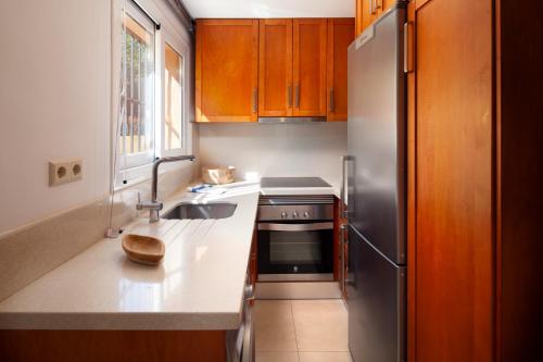Кухня или кухненски бокс в Playa & Beach Apartments Mijas Costa & Fuengirola by ALFRESCO STAYS