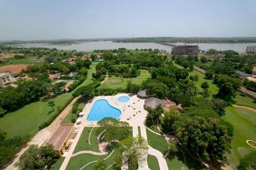an aerial view of a resort with a swimming pool at GRANADA l'Amitié in Bamako