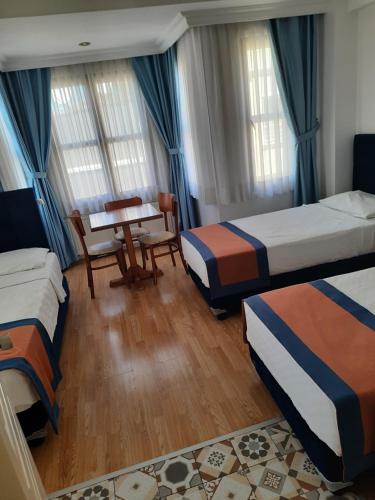 เตียงในห้องที่ Hotel Nova