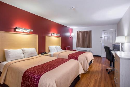 Ένα ή περισσότερα κρεβάτια σε δωμάτιο στο Red Roof Inn West Memphis, AR