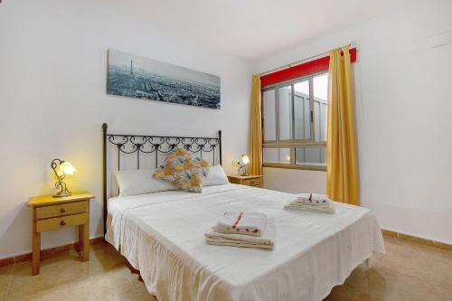 Posteľ alebo postele v izbe v ubytovaní Apartamento Juana