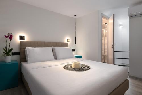 A bed or beds in a room at The City Gem Urban Apt.