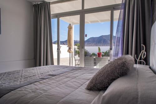 A bed or beds in a room at Villa Carol