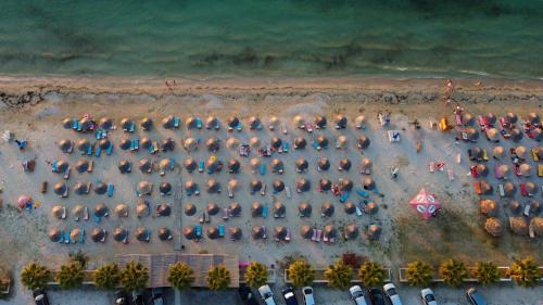 an overhead view of a parking lot at the beach at Hotel Amantia in Orikum