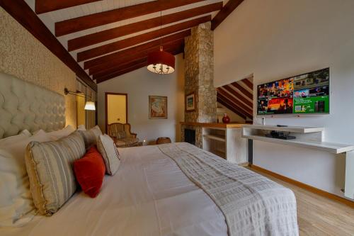 Katil atau katil-katil dalam bilik di Hotel & Spa Saint Michel