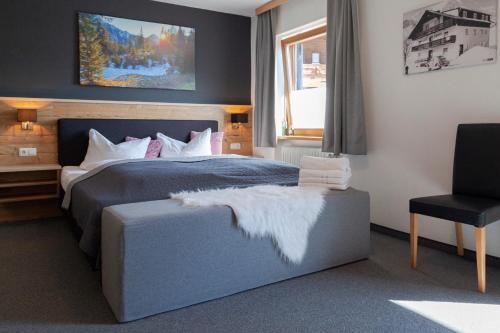 Postel nebo postele na pokoji v ubytování Berghotel TheLounge