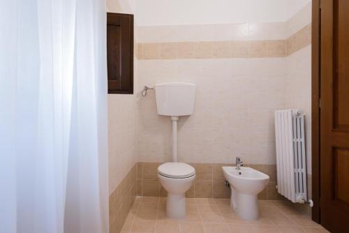 a bathroom with a toilet and a bidet at B&B Lanciano in Lanciano