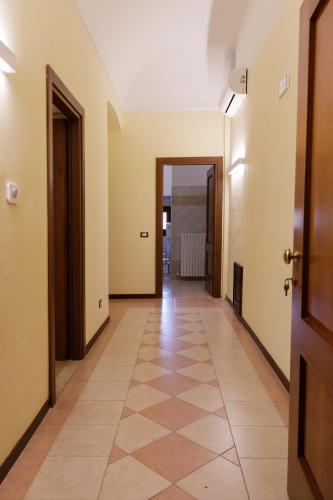 a corridor of an apartment with a hallway at B&B Lanciano in Lanciano