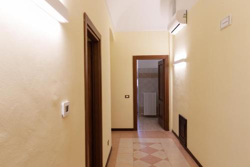 a hallway with two doors and a tile floor at B&B Lanciano in Lanciano