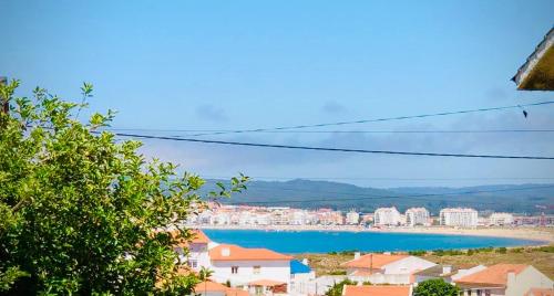 a view of a city and a body of water at Casa do Trevo in Salir de Porto