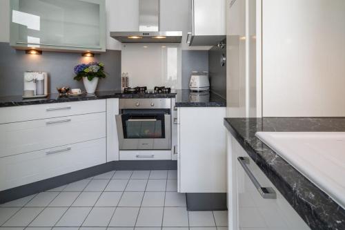 Dapur atau dapur kecil di VIP Apartment City Center Baden-Baden