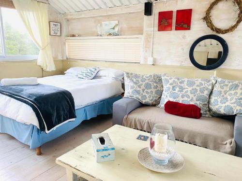 Ένα ή περισσότερα κρεβάτια σε δωμάτιο στο Top beach studio