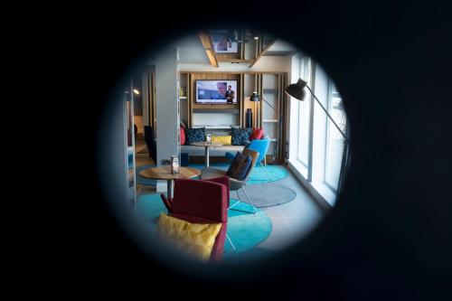 a view of a living room with a view of a living room at Holiday Inn Express Aberdeen City Centre by IHG in Aberdeen