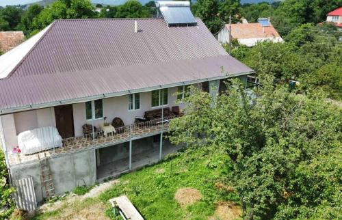 an aerial view of a house with a roof at Tamara B&B in Dsegh