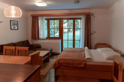 Postel nebo postele na pokoji v ubytování Luxury Apartments Bolf