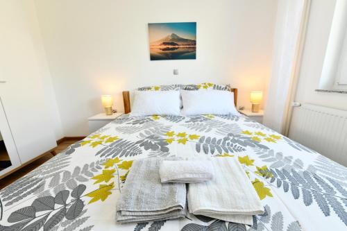 Ένα ή περισσότερα κρεβάτια σε δωμάτιο στο Apartmani Brium