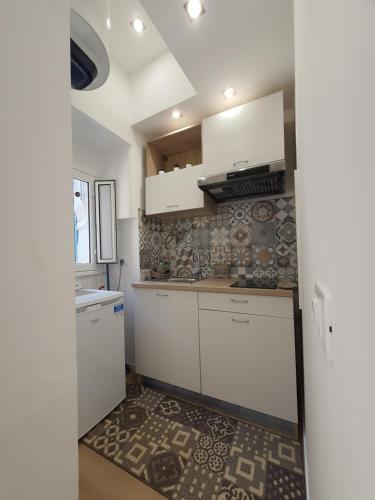 Kuchyň nebo kuchyňský kout v ubytování A casa di Claudia