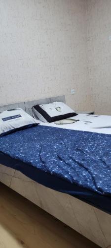 Ένα ή περισσότερα κρεβάτια σε δωμάτιο στο Guest House Guli